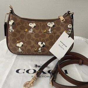 NWT Coach X Peanuts Teri Shoulder Bag In Signature Canvas With Snoopy Print